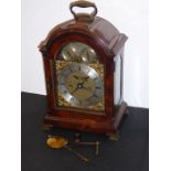 A fine 18th century figured mahogany-cased eight-day repeating bracket clock; the broken-arch dial