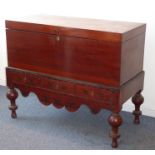 A 19th century style (later) Anglo-Indian hardwood cabinet on stand; three frieze drawers with