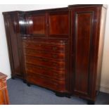 A Regency period gentleman's mahogany and boxwood-strung compactum; the inverted breakfront