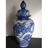 A large Chinese early 20th century Japanese (Arita) baluster-shaped porcelain vase moulded in low