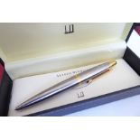 A modern cased Alfred Dunhill AD 2000 biro pen; brushed-steel cigar-shaped barrel with gold-plated