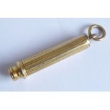 A late 19th/early 20th century yellow-metal (marks rubbed) pencil on fob suspension ring (total