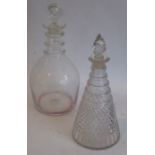 A 19th century magnum Prussian-shaped decanter, and a conical diamond-cut decanter and stopper