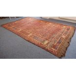 A large Bashir Turkmenistan carpet; 2nd half 19th century, predominately red ground (reduced in