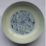 A circular Chinese porcelain blue-and-white dish; six-character mark of Daoguang and possibly of the