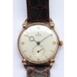 A vintage rose-gold cased Rolex Precision gentleman's wristwatch; bright and clear dial with