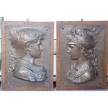 An large pair of opposing oak-backed bronze portrait plaques of classical gods; the plaques cast
