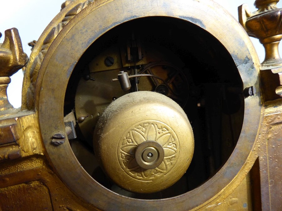 A 19th century gilt-metal eight-day mantle clock with Sèvres-style porcelain panels decorated with - Image 10 of 10