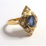 A sapphire, half-pearl and 18-carat yellow-gold dress ring of lozenge design; the central oval