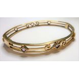 A 9-carat gold Victorian-style bracelet set with amethysts (13.3g) (The cost of UK postage via Royal