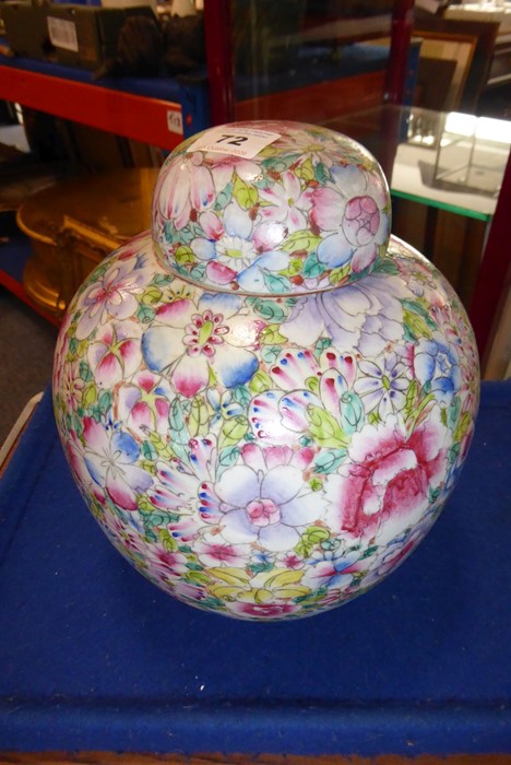 A late 19th/early 20th century Chinese porcelain vase and cover of baluster form; decorated in
