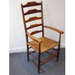 A late 19th/early 20th century Arts and Crafts 'Clissett' high back armchair; (possibly) by Edward
