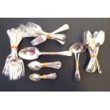 A heavy hallmarked solid silver flatware service; comprising six serving spoons, twelve smaller