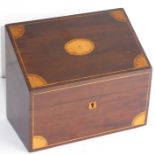 A late 19th/early 20th century mahogany and a boxwood-strung stationery cabinet; the angular fall