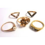 Five gem-set rings; two 9-carat V-shaped keeper rings, a diamond and 18-carat yellow-gold ring, a