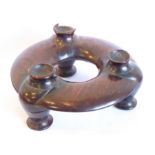 A late 19th/early 20th century Chinese heavy rosewood circular tripod censer stand (one support