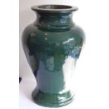 An extremely large and heavy late 19th century art pottery terracotta vase with dark-green glaze and