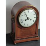 A 19th century mahogany and brass-inlaid eight-day bracket clock; white-enamel dial with Roman