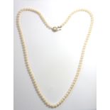 A cultured pearl necklace; cultured pearls measuring 6.0mm to 6.4mm in diameter to the 9-carat