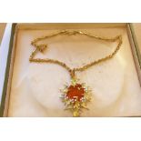 A late 1960s/1970s fire opal and diamond brooch/pendant by George Weil, the central octagonal fire