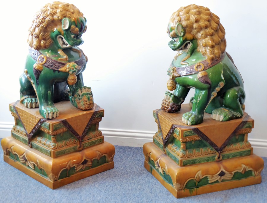A large and very imposing pair of floor-standing ceramic karashishi (Buddhistic temple lions),