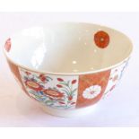 A late 19th century Japanese porcelain kutami-style bowl; the exterior painted with prunus blossom
