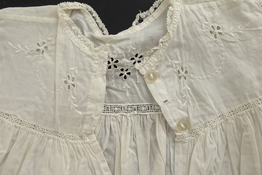 A circa 1930s child's dress; cotton lawn with white work detailing on yoke, C.B. opening - Image 3 of 3