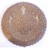 An unusual 19th century silver-inlaid copper dish; profusely inlaid with scrolling foliage,