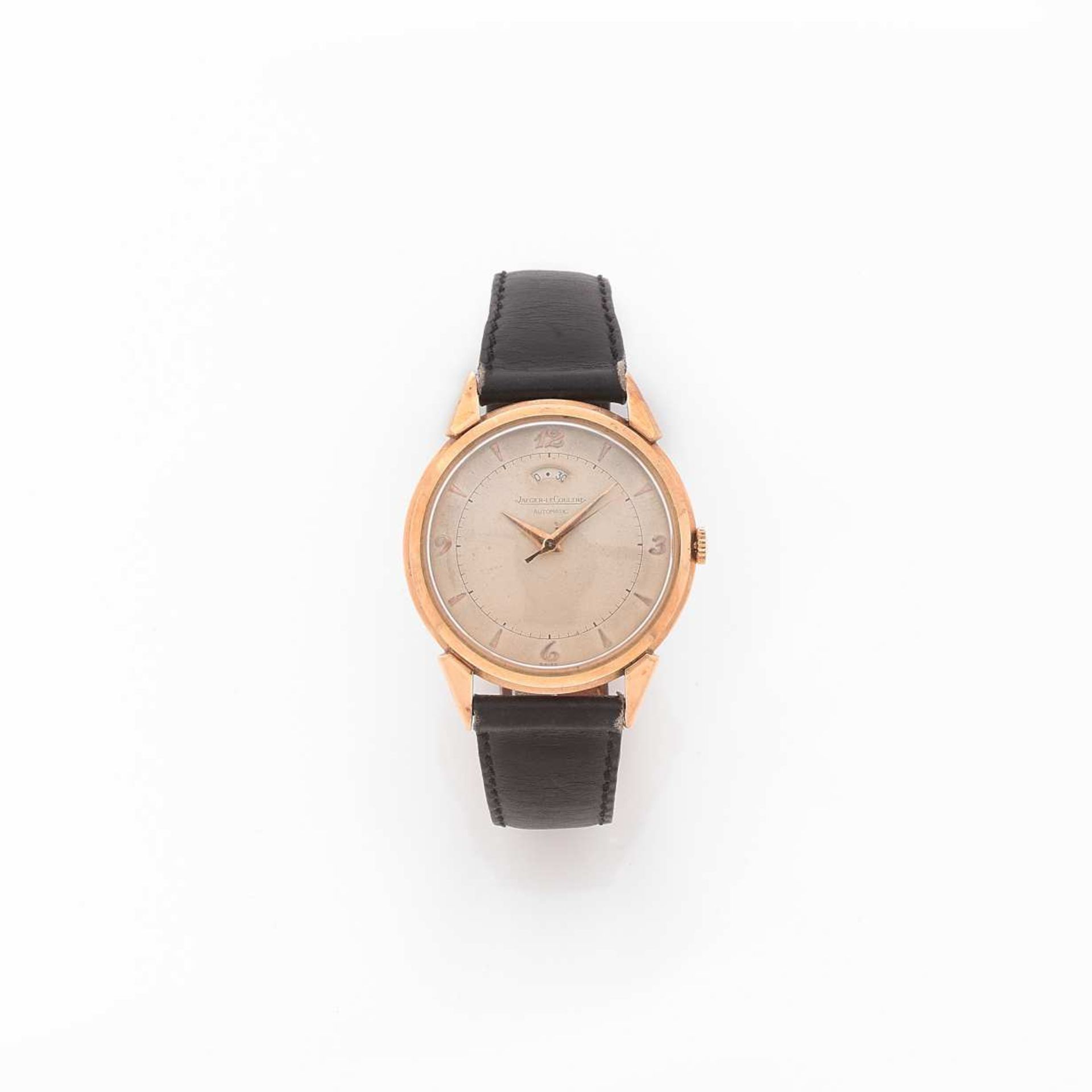 JAEGER LECOULTRE RESERVE DE MARCHE ANNEES 50 Montre bracelet en or rose sur cuir. BOÎTIER : rond