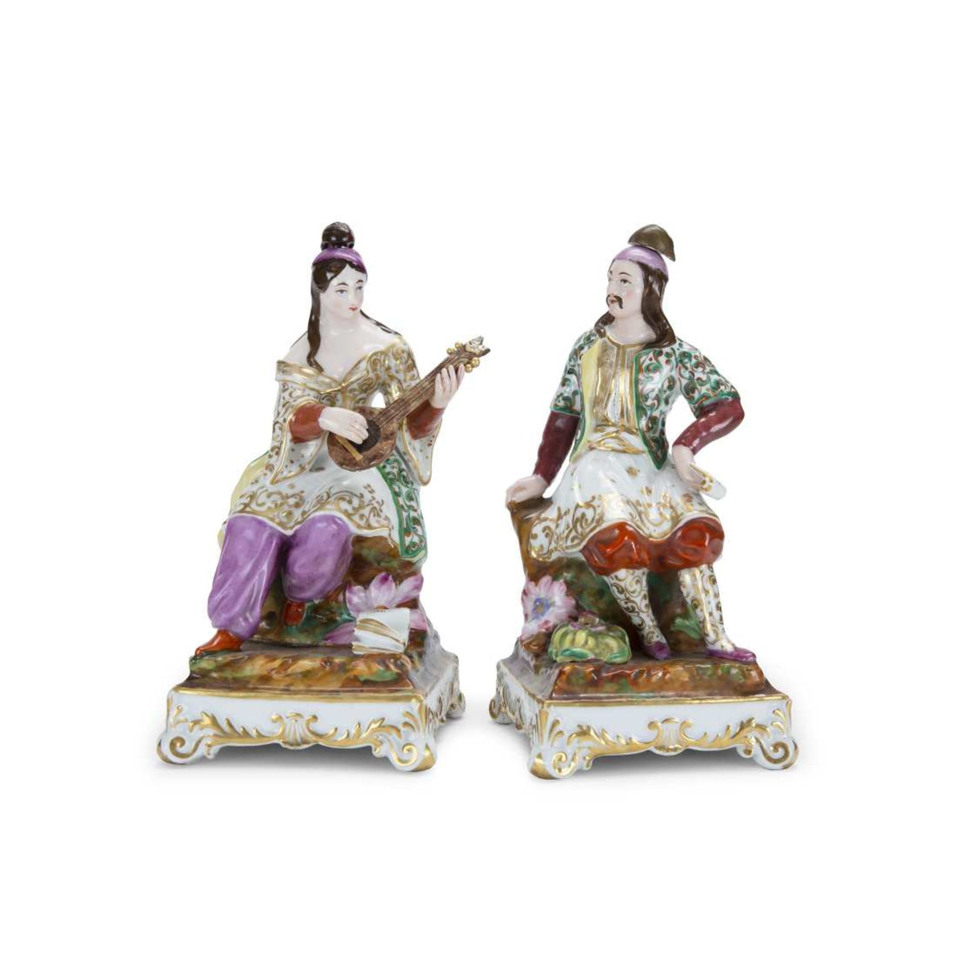 DEUX GRANDS FLACONS-STATUETTES DANS LE GOÛT DE JACOB-PETIT en porcelaine polychrome et dorée,