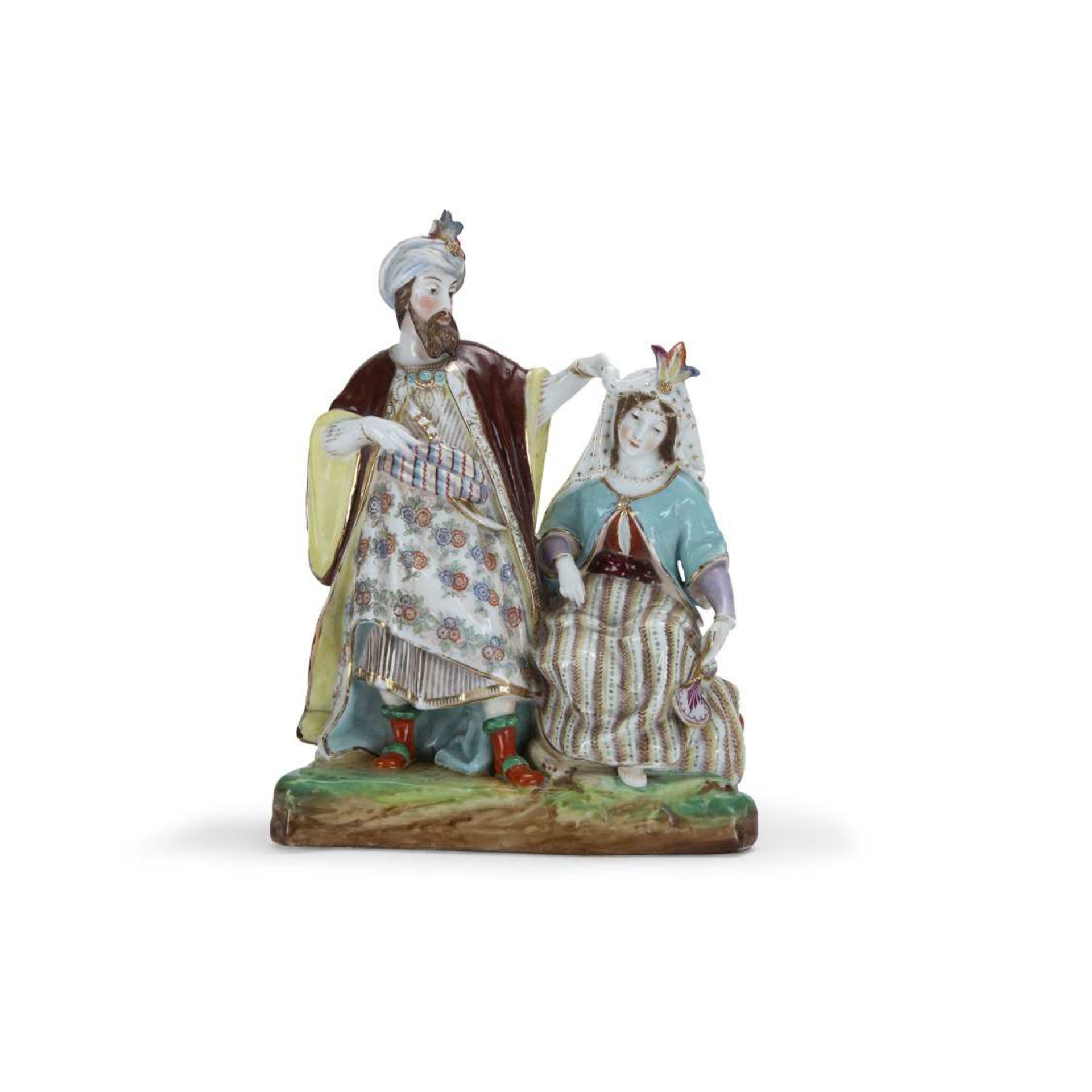 "LA VENTE D'UNE ESCLAVE CHRÉTIENNE" Groupe en porcelaine polychrome et dorée, représentant un