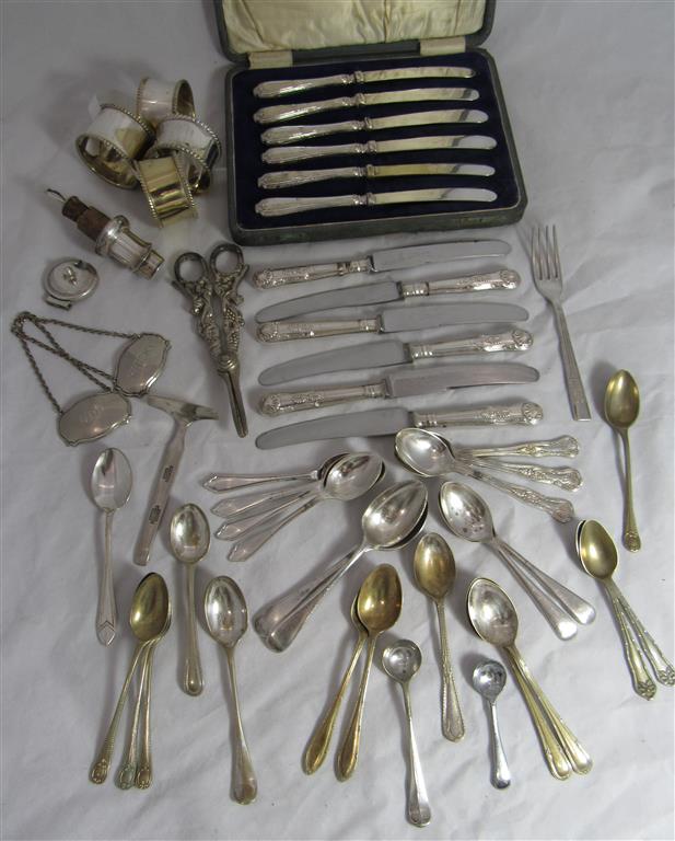 A cased set of 6 silver handled butter knives hallmarked for Sheffield together with some EPNS,