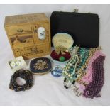 A collection of mid 20th century costume jewellery to include a small jewellery box, compact and