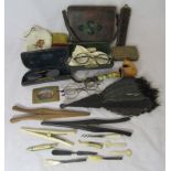 A collection of interesting items to include manicure, glove stretchers, vintage purses etc.