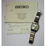 SEIKO - A 1974 ladies stainless steel Seiko automatic wrist watch with tonneau case, silvered