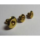 A cased set of three marked 9ct gold shirt studs, weight 2.3g.