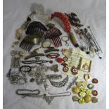 A collection of badges to include Red Cross together with hat pins, rabbit foots brooch hair