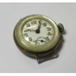 A mother of pearl cased watch head. Diameter 3cm.