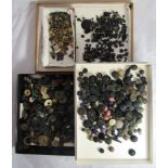 A large collection of a variety of early 20th century buttons to include mourning.