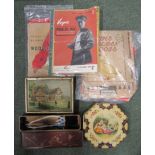 Two collectable tins together with a box of craft items, knitting patterns, song sheets,