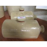 Two glazed earthenware stoppered bed warmers