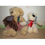 PlayMaker's Teddy carrying floppy ear dog together with a French sailor white teddy