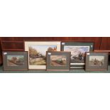 Three smaller and two larger framed glazed prints of trains