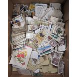 A quantity of various cigarette cards