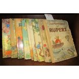 A collection of nine Rupert Annuals 1950, 1951, 1952, 1953, 1954, 1955, 1956, 1957 and 1958.