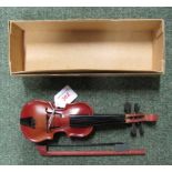 A miniature toy violin, made in Czechoslovakia with box and wax in original box