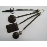 A Chatelaine with leather straps, leather covered perfume bottle, scissors with leather case,