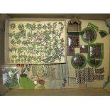 Britains miniature garden 1930s. Large quantity of flowers together with pots, beds, walls, pavings,