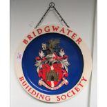 A fibreglass hanging wall plaque for the Bridgwater Building Society showing the Bridgwater Coat