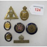 A small collection of Military associated badges WWI, War Service, Male and Female, Comrades of